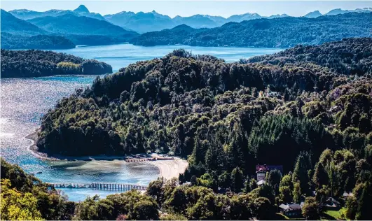  ??  ?? STUNNING SCENERY: The crystal-clear waters around the upmarket holiday resort of Villa La Angostura in Patagonia region