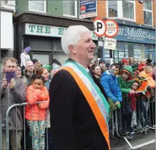  ??  ?? Grand Marshall Gerry Mullane at the reviewing stand on the big day.