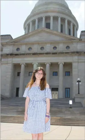  ?? MARK BUFFALO/TRILAKES EDITION ?? Julia Nall of Bryant stands in front of the Arkansas Capitol in Little Rock. Nall helped start the Young Democrats club at Bryant High School and was elected national committeew­oman from Arkansas for the Young Democrats of America. Nall will attend the...