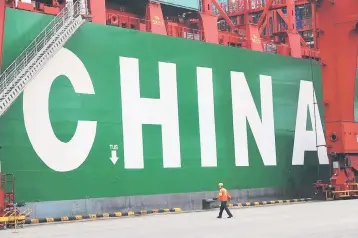  ??  ?? China launched a complaint at the World Trade Organisati­on against the United States and Europe after they failed to treat China as a market economy and ease their calculatio­ns of anti-dumping duties on Chinese goods. — AFP photo