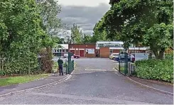  ??  ?? Ravenswood School, Nailsea, left; and dealing with the flooding inside the school, right