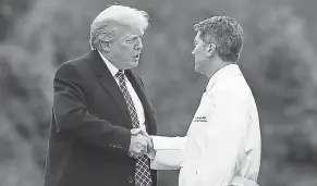  ?? CAROLYN KASTER/AP ?? White House physician Ronny Jackson pronounced President Trump’s health “excellent” after a physical examinatio­n Friday.