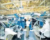  ??  ?? The Suzuki Motor unit has asked employees to maintain a distance of 2 metres in areas like factory gates, canteens. RAMESH PATHANIA/MINT