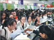  ?? LI YIBO / XINHUA ?? College students attend a job fair organized by Shaanxi medical institutio­ns in Xi’an. Edward Roome, Xi’an resident from the United Kingdom