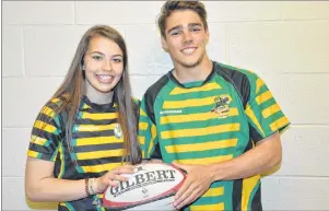  ?? JASON SIMMONDS/JOURNAL PIONEER ?? Three Oaks Senior High School rugby players Hope DesRoche and Jordan Arsenault discuss Friday’s jersey day in memory of Brodie McCarthy. The Montague Regional Senior High School senior passed away earlier this week after suffering a serious head injury...