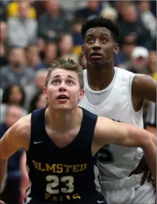  ?? RANDY MEYERS — FOR THE MORNING JOURNAL ?? Braden Galaska of Olmsted Falls boxes out Deonte Benejan of Lorain during a free-throw attempt at the district finals on March 9.
