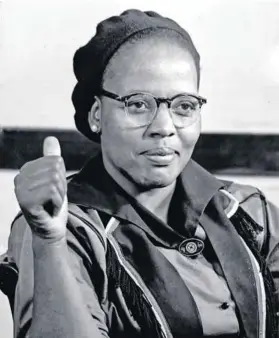  ?? Weinberg/Robben Island Mayibuye Archives Photo: Eli ?? Thumbs up: Florence Mkhize while under house arrest in Natal.