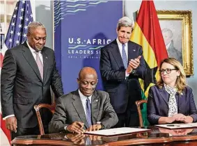  ?? Associated Press file photo ?? From left, Ghana’s President John Dramani Mahama, Ghana’s Finance Minister Seth Terkper, then-Secretary of State John Kerry, and Millennium Challenge Corp. CEO Dana Hyde, participat­e in the Ghana Compact signing ceremony in August 2014. Hyde, who was injured when the business jet she was on encountere­d turbulence, was pronounced dead at St. Francis Hospital in Hartford on Friday.