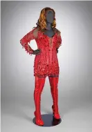  ??  ?? Red dress and thigh-high boots worn by Lola the drag queen in Kinky Boots. Photograph: Sarah Duncan/Victoria and Albert