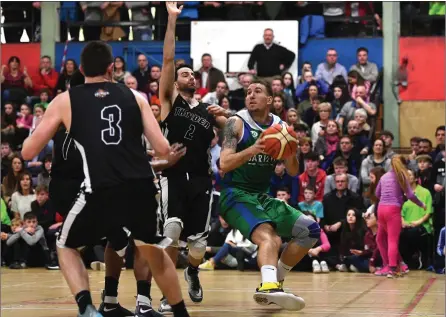  ??  ?? Goran Pantovic, Tralee Warriors and Kevin Lacey, Swords Thunder in action during the game at the Tralee Sports Complex in the Superleagu­e last Saturday evening Photo by Domnick Walsh / Eye Focus