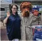  ??  ?? Martha Turner Sotheby’s Internatio­nal Realty agent Missy Wibbelsman was on the job with McGruff the Crime Dog at a recent Village Place event.