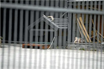  ?? STUFF ?? The dog took the baby from his bassinet during the attack at a Hamilton house in October 2020. Pictured is a dog kennel at the home.