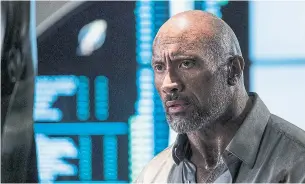  ?? KIMBERLY FRENCH/UNIVERSAL PICTUR/TNS ?? Dwayne Johnson, the star of Skyscraper, said the movie’s premise has a clear reverence for movies such as The Towering Inferno, Die Hard and The Fugitive.