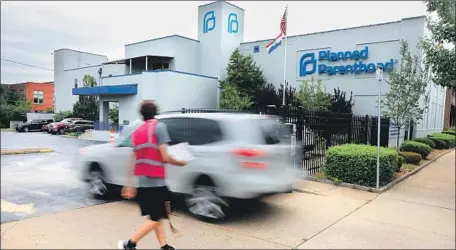  ?? Christian Gooden St. Louis Post-Dispatch ?? A PLANNED PARENTHOOD clinic in Missouri, where a judge struck down a slate of abortion restrictio­ns in August and advocates are suing to put the rules to a public vote. Some conservati­ve states have managed to shut down many clinics even after losing in court.