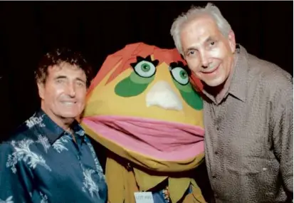  ?? JOHN HAYES/ASSOCIATED PRESS ?? Above, puppeteers Sid (left) and Marty Krofft stood next to one of their many creations in 1998 in Beverly Hills, Calif. At left, Mr. Krofft (left) and Sid presented four of their famed puppets in 1966 in front of the Colosseum as in Rome, Italy.