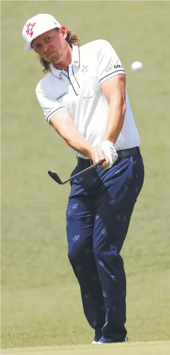  ?? ?? Australia’s Cameron Smith chips on to the second green at the Masters at Augusta National Golf Club. Picture: Jamie Squire/Getty Images