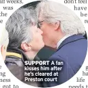  ??  ?? SUPPORT A fan kisses him after he’s cleared at Preston court