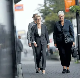  ?? SEAN KILPATRICK/THE CANADIAN PRESS Ontario Premier Kathleen Wynne, left, accompanie­d by her partner, Jane Rounthwait­e, arrives to appear as a witness in the Election Act bribery trial in Sudbury, Ont., on Wednesday. ??