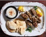  ?? For The Washington Post/STACY ZARIN GOLDBERG ?? Turkey Kebabs With Tahini Sauce