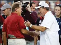  ?? BOB LEVEY — GETTY IMAGES/TNS ?? Alabama coach Nick Saban, left, and Texas A&M coach Jimbo Fisher were on friendlier terms after a game last season.