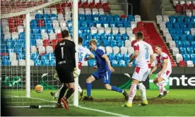  ??  ?? Rangers’ Filip Helander finishes to make it 1-1 against Slavia Prague. Photograph: Kirk O’Rourke/Rangers FC/Shuttersto­ck