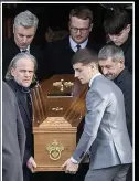  ?? ?? SOMBRE Coffin leaves the church