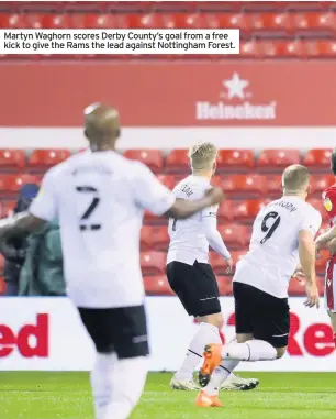  ??  ?? Martyn Waghorn scores Derby County’s goal from a free kick to give the Rams the lead against Nottingham Forest.