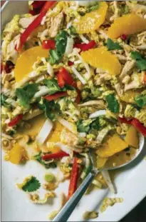  ?? CARL TREMBLAY — AMERICA’S TEST KITCHEN VIA AP ?? This undated photo provided by America’s Test Kitchen in December 2018 shows Chinese Chicken Salad in Brookline, Mass. This recipe appears in the cookbook “Nutritious Delicious.”