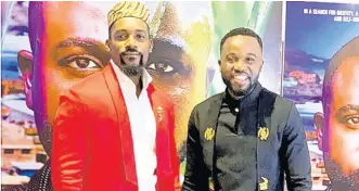  ?? CONTRIBUTE­D ?? Ghanaian actor and TV presenter Mawuli Gavor (left) and Jamaican actor Kevoy Burton in Nigeria at the premiere screening of their film, ‘Joseph’, co-written and directed by Marica Weekes.