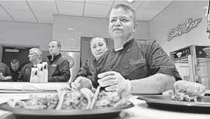  ?? MIKE ASHMORE/SPECIAL TO MYCENTRALJ­ERSEY.COM ?? Among the new food offerings at TD Bank Ballpark this season are fresh tacos from Mozzarella Cucina.