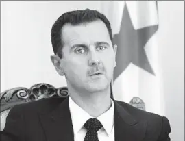  ?? Vahid Salemi
Associated Press ?? SYRIAN President Bashar Assad counts Russia as a key ally. The U.S. Defense secretary likened airstrikes on Assad’s foes to “pouring gasoline on the civil war.”