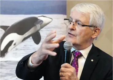  ?? JONATHAN HAYWARD / THE CANADIAN PRESS ?? Transport Minister Marc Garneau announces a new Oceans Protection Plan, in collaborat­ion with Indigenous communitie­s, at a shipping conference in Vancouver Tuesday.