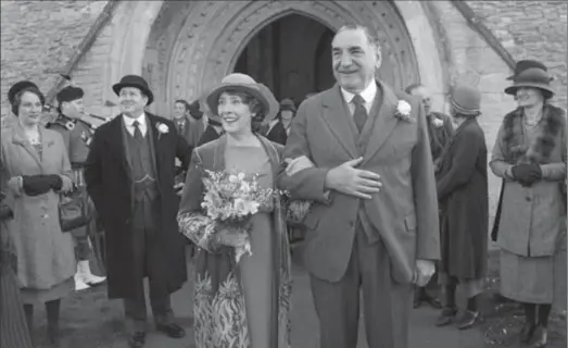  ?? NICK BRIGGS, THE ASSOCIATED PRESS ?? Phyllis Logan as Mrs. Hughes, center left, and Jim Carter as Mr. Carson in a scene from the final season of Downton Abbey.