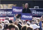  ?? JOHN BAZEMORE - ASSOCIATED PRESS ?? Sen. David Perdue, R-Ga., speaks during a campaign rally Dec. 21in Milton, Ga.