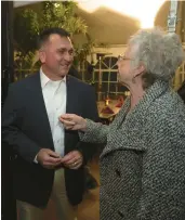  ?? RICK KINTZEL/THE MORNING CALL ?? Kevin Dellicker talks to one of his volunteers, Bonnie Smoyer of New Hampshire, on Tuesday at his watch party at Madeline’s in Fogelsvill­e.