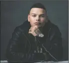  ?? The Associated Press ?? BROWN: Country singer Kane Brown posing for a portrait in New York on Nov. 7, 2018. Brown says his new single “Homesick” may have been written about his own experience­s of life on the road traveling and being away from his loved ones, but military families have really connected to it, too.