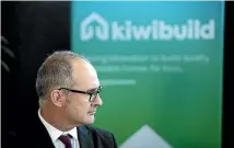  ??  ?? The Government has said it will build 100,000 homes over the coming decade, 50,000 of those outside Auckland. Pictured is Housing and Urban Developmen­t Minister Phil Twyford speaking to media at the Build NZ conference.