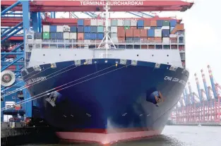  ?? — Reuters ?? Container ship CMA CGM Antoine de Saint Exupery is moored at the loading terminal in the port of Hamburg, Germany .