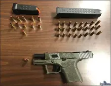  ?? COURTESY — BOSTON POLICE DEPARTMENT ?? The loaded Glock police say a Boston cannabis dispensary employee, who does not have a gun license, brought to work Tuesday.