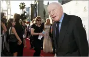  ?? PHOTO BY CHRIS PIZZELLO — INVISION — AP, FILE ?? Norman Lloyd poses before a 50th anniversar­y screening of the film “The Sound of Music” at the opening night gala of the TCM Classic Film Festival on March 26, 2015, in Los Angeles.