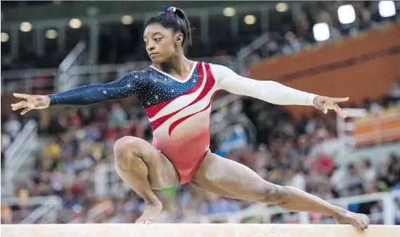  ?? TYLER ANDERSON ?? U.S. gymnast Simone Biles, who won three gold medals and a bronze at the 2016 Olympics in Rio de Janeiro, displayed speed, power, strength, agility and flexibilit­y.