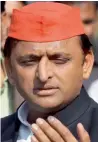  ?? PTI ?? Akhilesh Yadav displays the indelible ink on his finger in Saifai. —