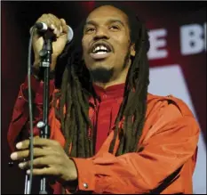  ?? ASSOCIATED PRESS ?? Benjamin Zephaniah performs on stage during the One Big No anti-war concert, at Shepherd’s Bush Empire in London on March 15, 2003.