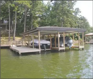  ?? Submitted photo ?? DOCKS READY: Williamson Boat Docks Inc.’s most recent big job was for the city of Lake Village: two fishing piers. It was ready in time for their July Fourth celebratio­n.