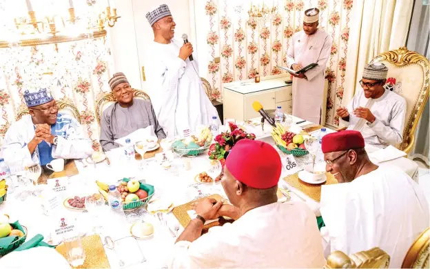 ?? Photo: State House ?? President Muhammadu Buhari with the leadership of the National Assembly, during the break of Ramadan fast at the State House in Abuja yesterday