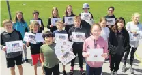  ?? PHOTO: MATTHEW MCKEW ?? Academic achievers . . . Proudly holding their certificat­es from University of Canterbury and University of Otago examinatio­ns are Arrowtown School pupils (from left, back) Edie Spary, Jackson Nolan, Grace Kunath, Lola Castles, Louis Rees Dalley, Nikao Panapa, (middle) Harry Lightfoot, Max Johnstone, Jack Lucas, Felix Spary, Madi Chambers, Tiara Willett, Tallulah Nelson, (front) Solomon Phoon and Isabelle Mahoney.