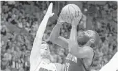  ?? JOE SKIPPER/AP ?? Heat guard Goran Dragic tries to prevent the Rockets’ James Harden from getting a shot off Friday night.