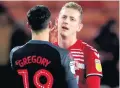  ??  ?? Big win: Stoke’s Lee Gregory (left) and Boro’s Northern Ireland ace George Saville at the end of last night’s relegation battle