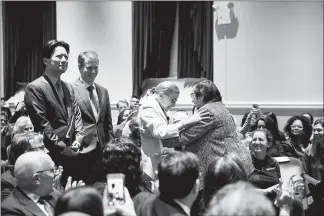  ?? PHOTOS BY SAM HODGSON / THE NEW YORK TIMES ?? U.S. Supreme Court Justice Ruth Bader Ginsburg greets Sheila Birnbaum, an attorney, before speaking at New York University’s law school. Ginsberg, sometimes called Notorious R.B.G. by fans, is in the midst of a string of public appearance­s along the Eastern seaboard.