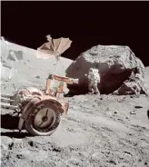  ?? NASA ?? Scientist-astronaut Harrison H. Schmitt is photograph­ed working beside a huge boulder at Station 6 (base of North Massif) on the moon during the Apollo 17 expedition in 1972.